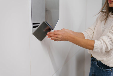 Which is cheaper: paper towels or hand dryers?